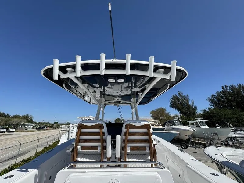 Slide: The Image of 2024 Southport 30 FE boat with dual helm seats and rod holders. - 29