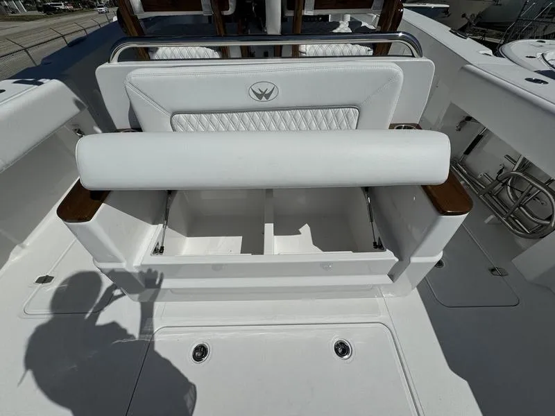 Slide: The Image of 2024 Southport 30 FE boat seating and storage area. - 31