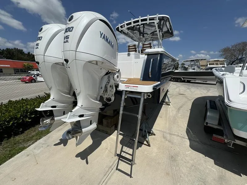 Slide: The Image of 2024 Southport 30 FE boat with twin Yamaha outboard engines on display. - 4