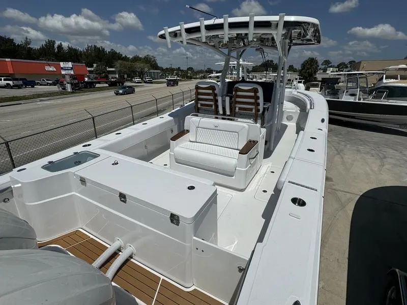 Slide: The Image of 2024 Southport 30 FE boat with seating and storage compartments. - 5