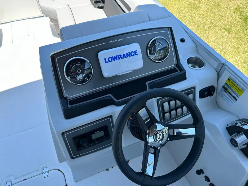 Slide: The Image of 2024 Hurricane FunDeck 2260 RE OB boat dashboard with Lowrance navigation system. - 10