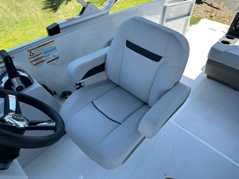Slide: The Image of Captain's chair of the 2024 Hurricane FunDeck 2260 RE OB boat. - 13