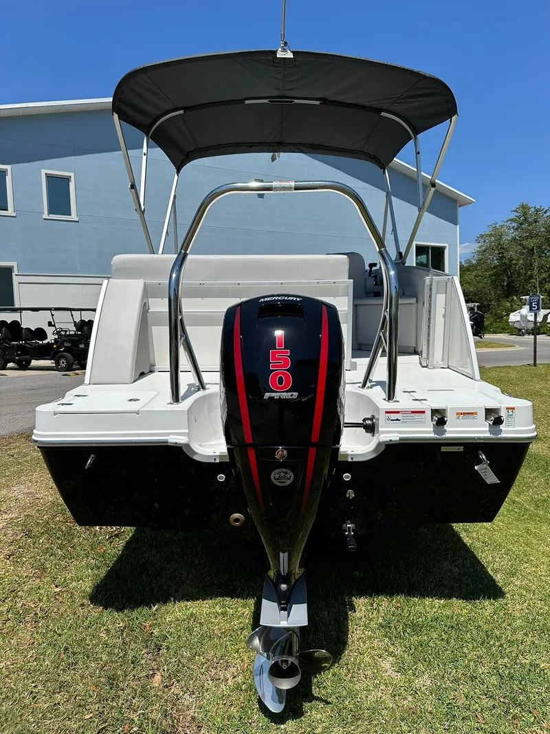 Slide: The Image of 2024 Hurricane FunDeck 2260 RE OB boat with 150 HP outboard motor. - 2