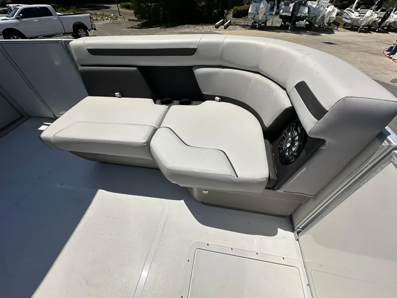 Slide: The Image of 2024 Hurricane FunDeck 2260 RE OB boat interior seating area. - 8