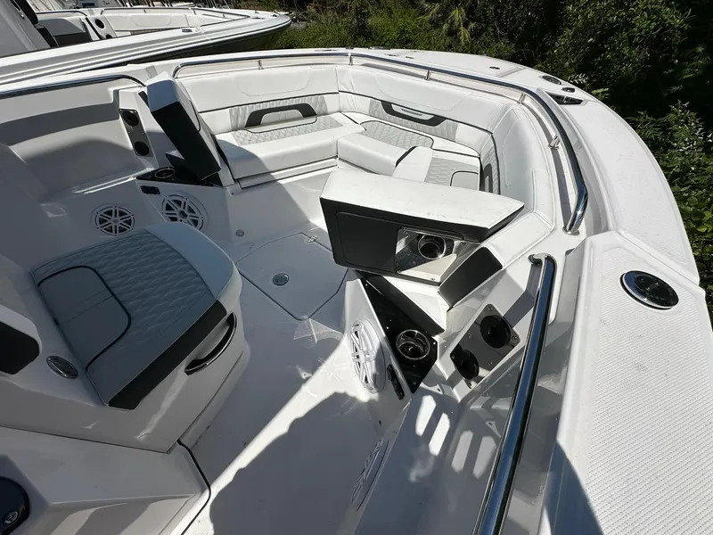 Slide: The Image of 2024 Blackfin 252 CC boat interior with seating and storage compartments. - 5