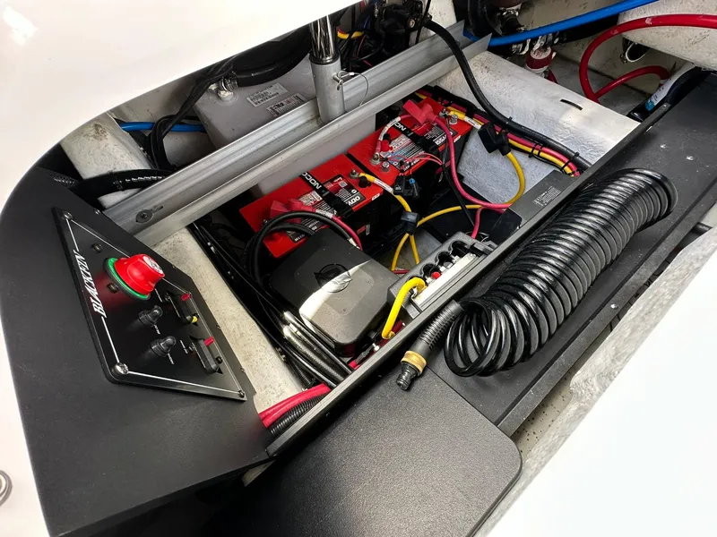 Slide: The Image of 2024 Blackfin 232 DC boat electrical system with battery and wiring components. - 15