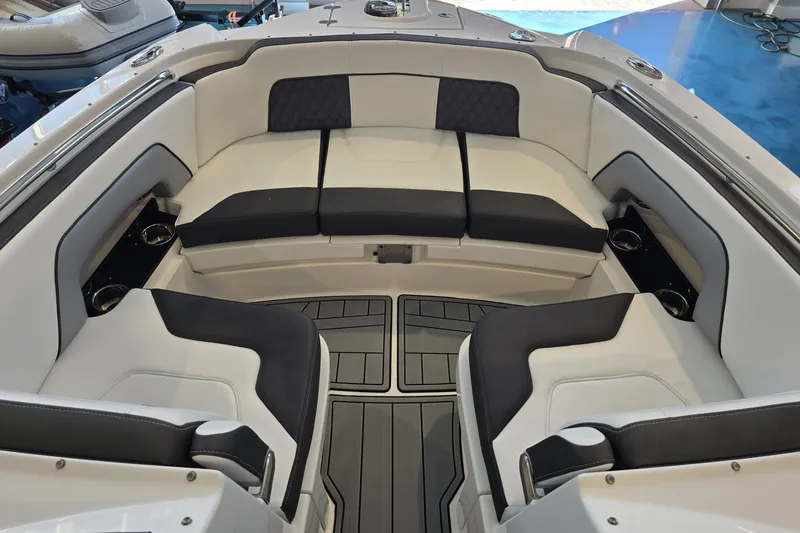 Slide: The Image of 2024 Monterey M-65 boat interior with luxurious seating and modern design. - 11