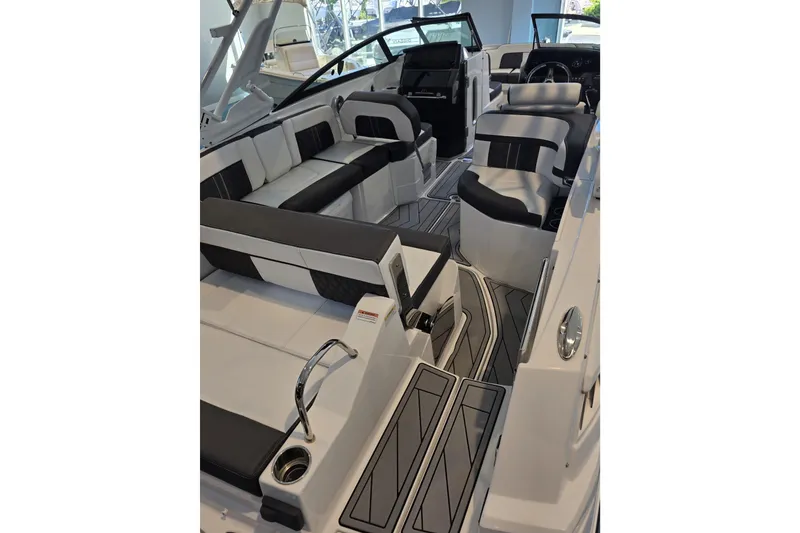 Slide: The Image of 2024 Monterey M-65 boat interior with sleek seating and modern design. - 7