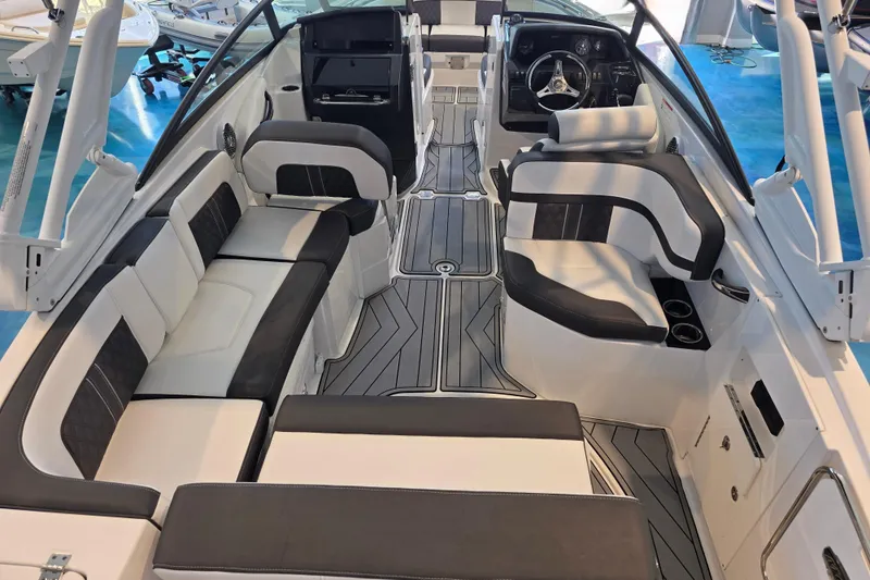 Slide: The Image of 2024 Monterey M-65 boat interior with sleek seating and modern design. - 9