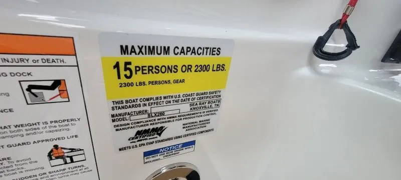 Slide: The Image of Capacity label on 2024 Sea Ray SLX 260, max 15 persons or 2300 lbs. - 28