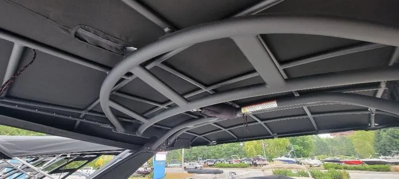 Slide: The Image of 2024 Sea Ray SLX 260 boat canopy structure, showcasing sleek design and durable materials. - 8