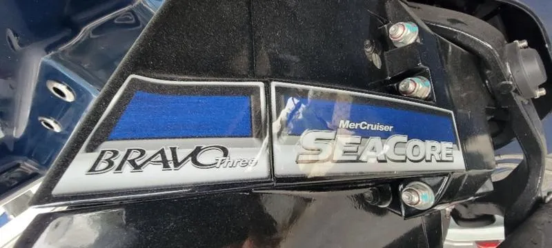 Slide: The Image of Close-up of 2024 Sea Ray SLX 260 Bravo Three Seacore engine detail. - 9