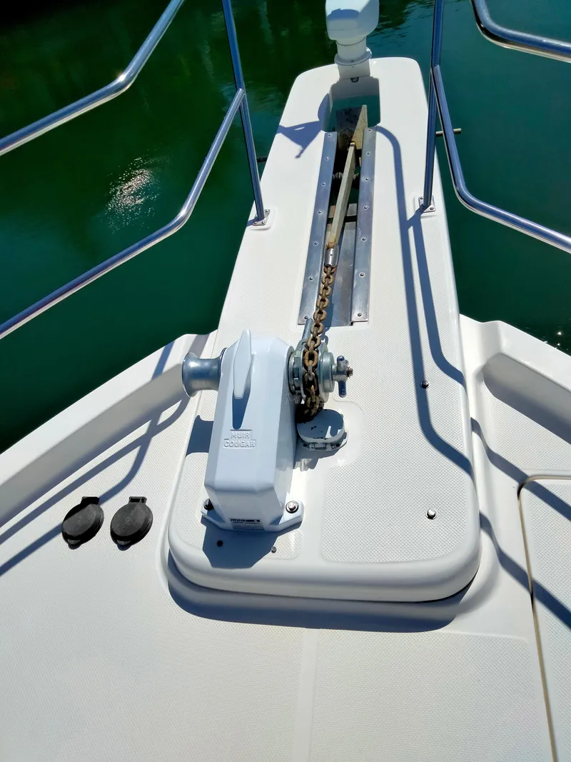 Slide: The Image of Anchor windlass on Bayliner 4788 Pilot House Motoryacht, 1998 model. - 23