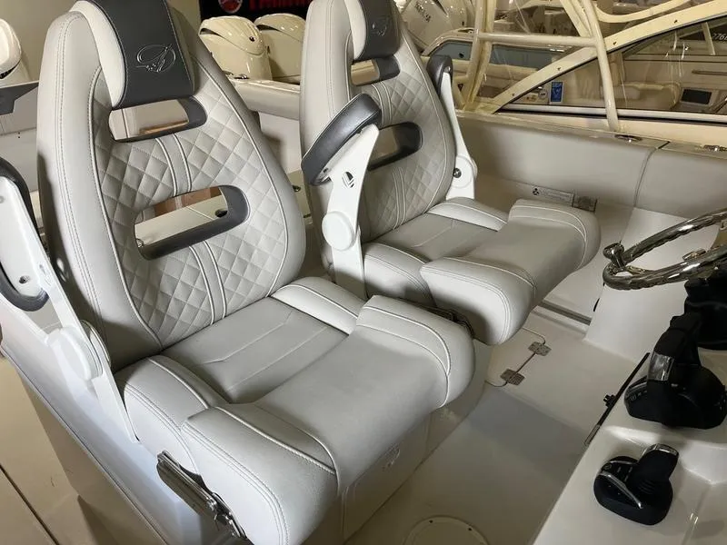 Slide: The Image of Luxurious seating in 2025 Sailfish 312 CC boat, featuring modern design and comfort. - 13