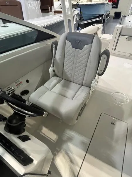 Slide: The Image of 2025 Sailfish 276 DC boat captain's chair and helm station. - 4