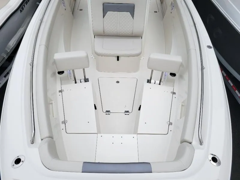 Slide: The Image of 2025 Sailfish 272 CC boat interior with seating and storage compartments. - 18