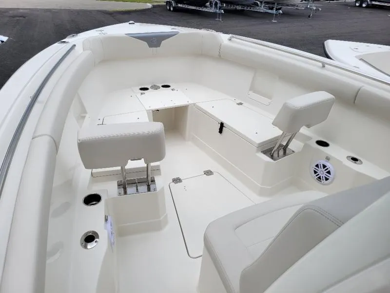 Slide: The Image of Interior of 2025 Sailfish 272 CC boat with seating and storage compartments. - 21