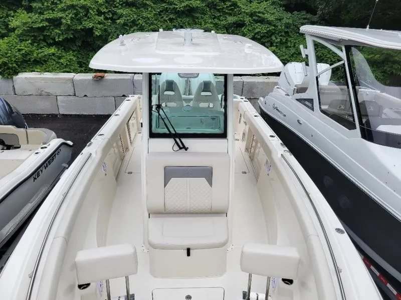 Slide: The Image of 2025 Sailfish 272 CC center console boat with seating and T-top. - 25