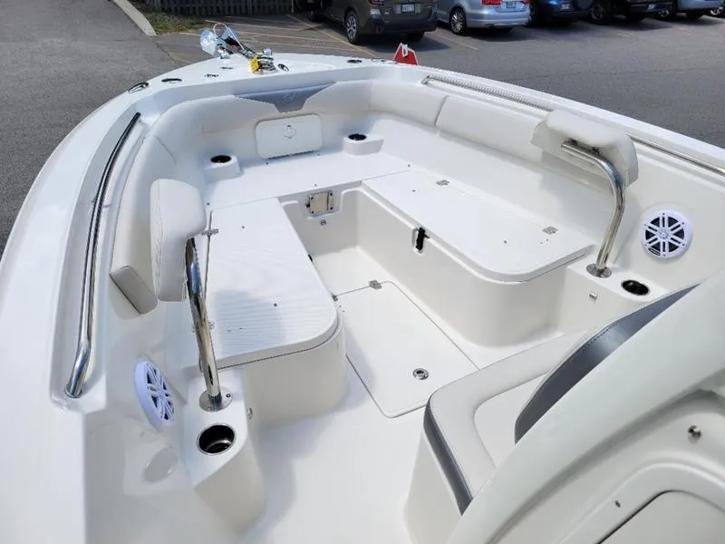 Slide: The Image of 2025 Sailfish 241 CC boat interior with seating and storage compartments. - 16