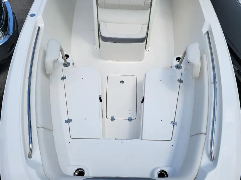 Slide: The Image of 2025 Sailfish 241 CC boat interior with seating and storage compartments. - 17