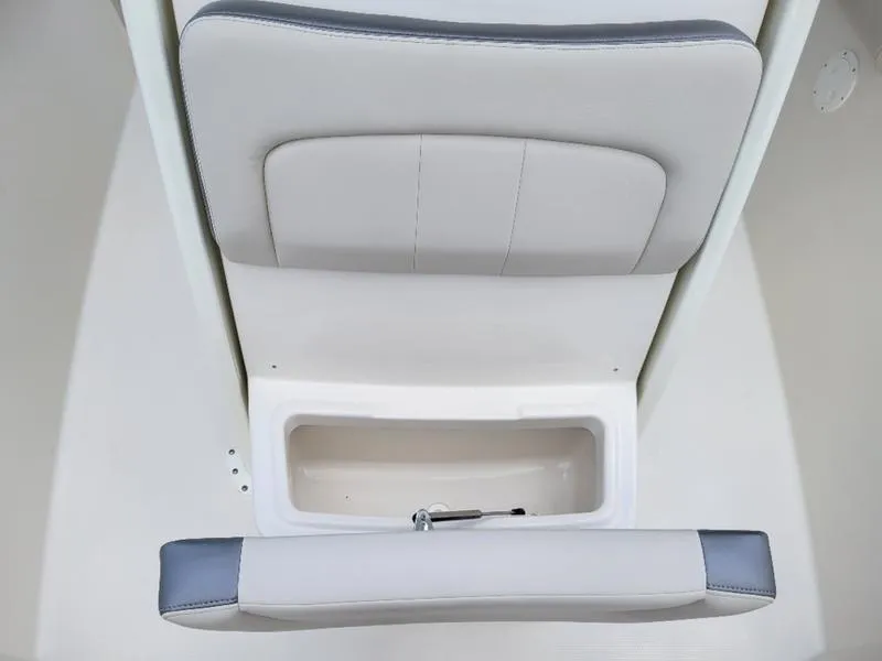 Slide: The Image of 2025 Sailfish 241 CC boat seat with storage compartment. - 20
