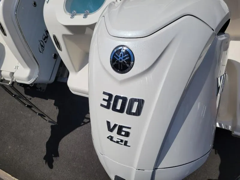 Slide: The Image of 2025 Sailfish 241 CC boat with 300 HP V6 4.2L engine. - 7