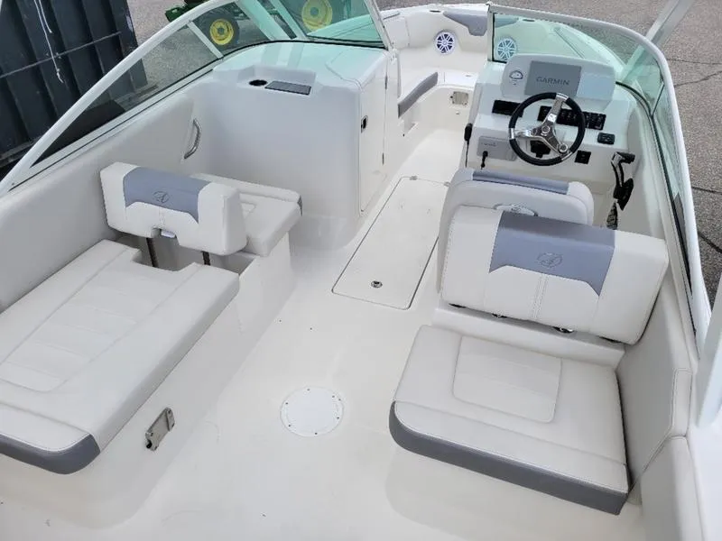Slide: The Image of 2025 Sailfish 236 DC boat interior with Yamaha engine, featuring spacious seating and storage. - 7