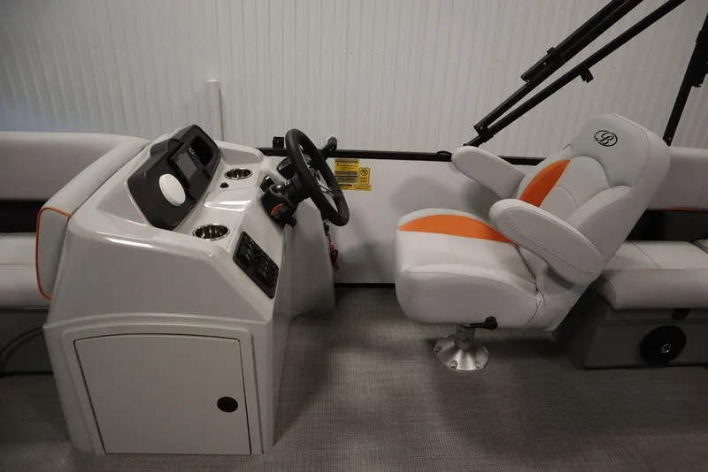 Slide: The Image of 2024 Bentley Pontoons 203 Bolt Tri-Toon interior with steering console and captain's chair. - 17