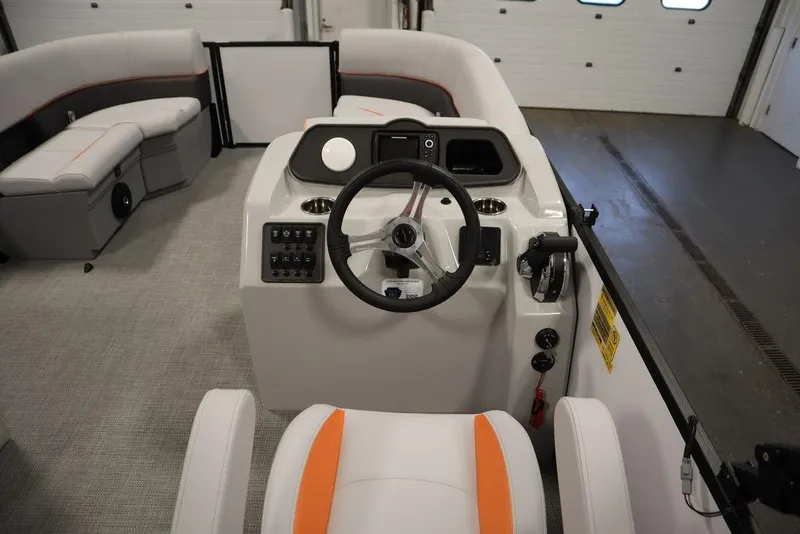 Slide: The Image of 2024 Bentley Pontoons 203 Bolt Tri-Toon interior with steering wheel and seating. - 18