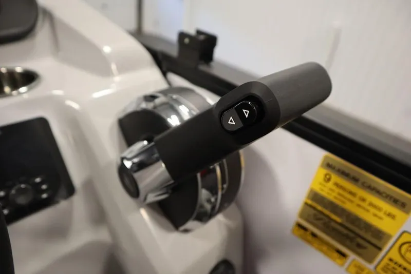 Slide: The Image of Close-up of 2024 Bentley Pontoons 203 Bolt Tri-Toon throttle control. - 25
