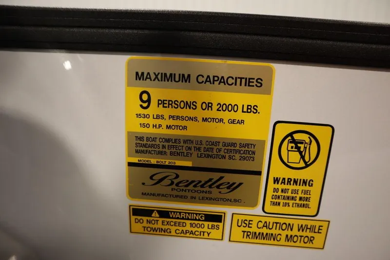 Slide: The Image of Capacity label for 2024 Bentley Pontoons 203 Bolt Tri-Toon, 9 persons or 2000 lbs. - 26