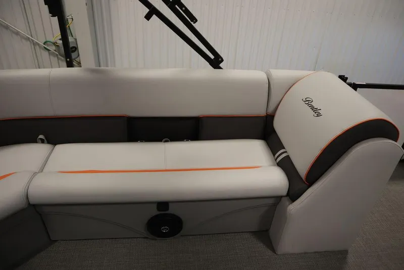 Slide: The Image of 2024 Bentley Pontoons 203 Bolt Tri-Toon interior seating with elegant design and branding. - 31