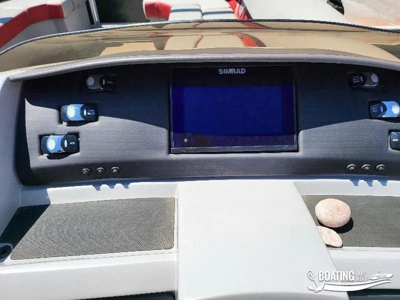 Slide: The Image of Dashboard of a 2021 Bennington L25 Stern Radius boat with Simrad display. - 15