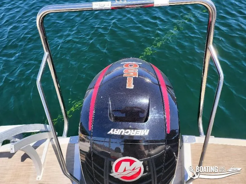 Slide: The Image of Mercury 150 outboard motor on a 2021 Bennington L25 Stern Radius boat. - 18
