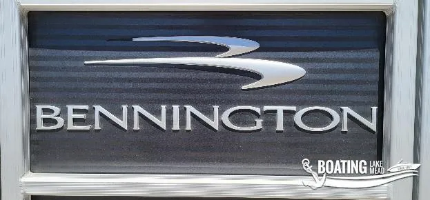 Slide: The Image of 2021 Bennington L25 Stern Radius logo with Boating Lake Mead branding. - 22