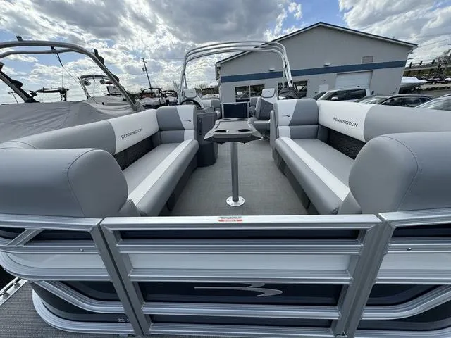 Slide: The Image of 2024 Bennington 22 SSR pontoon boat with spacious seating and modern design. - 14