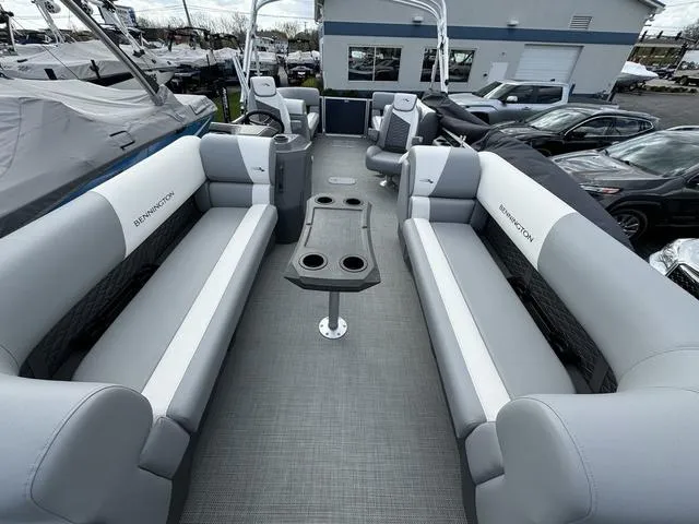 Slide: The Image of 2024 Bennington 22 SSR pontoon boat interior with spacious seating and cup holders. - 15