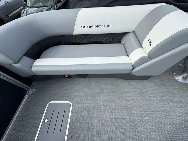 Slide: The Image of 2024 Bennington 22 SSR boat interior with gray and white seating. - 3
