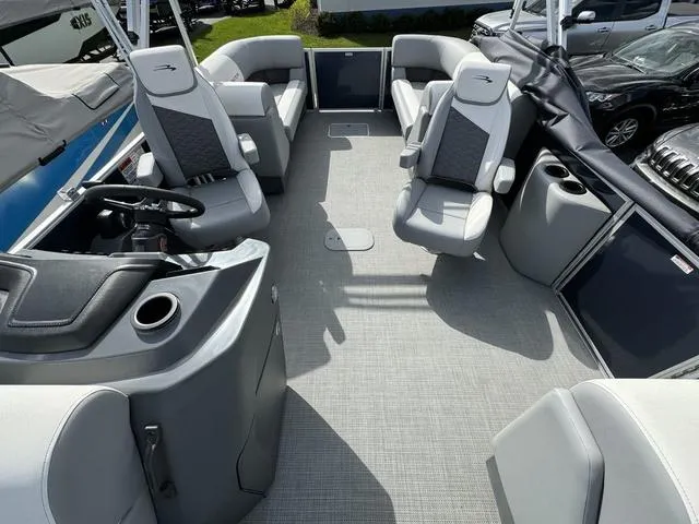 Slide: The Image of 2024 Bennington 22 SSR boat interior with spacious seating and modern design. - 8
