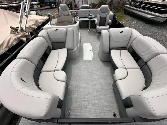 Slide: The Image of 2024 Starcraft SLS 3 Q DH pontoon boat with spacious seating and modern design. - 2