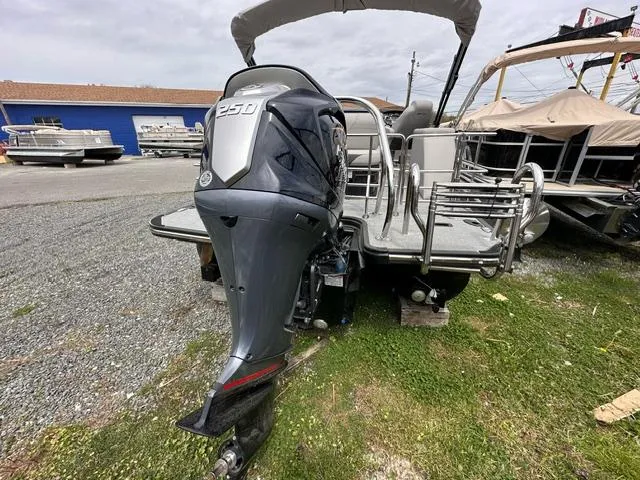 Slide: The Image of 2024 Starcraft SLS 3 Q DH pontoon boat with 250 HP outboard motor. - 7