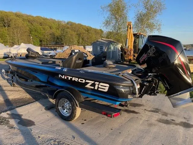 Slide: The Image of 2024 Nitro Z19 boat with Mercury Pro XS engine on trailer. - 2