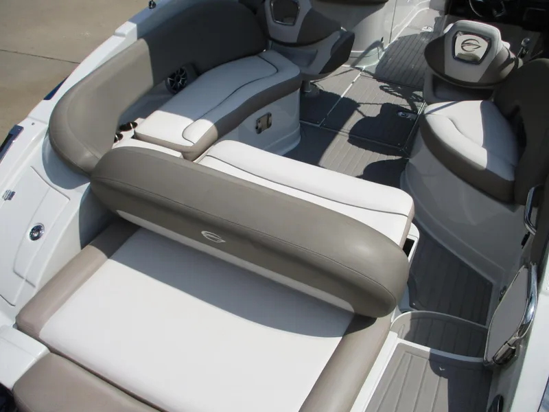Slide: The Image of 2019 Crownline Eclipse E255 boat interior with gray and white seating. - 4