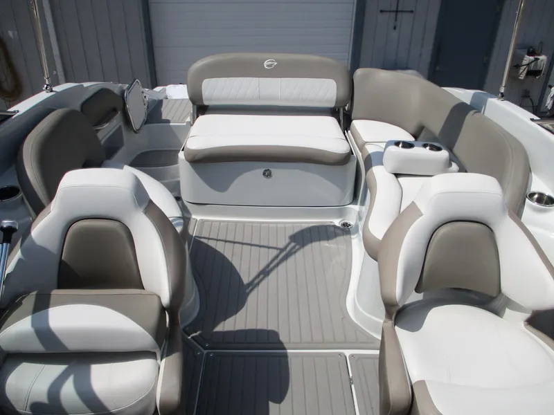 Slide: The Image of 2019 Crownline Eclipse E255 boat interior with gray and white seating. - 6