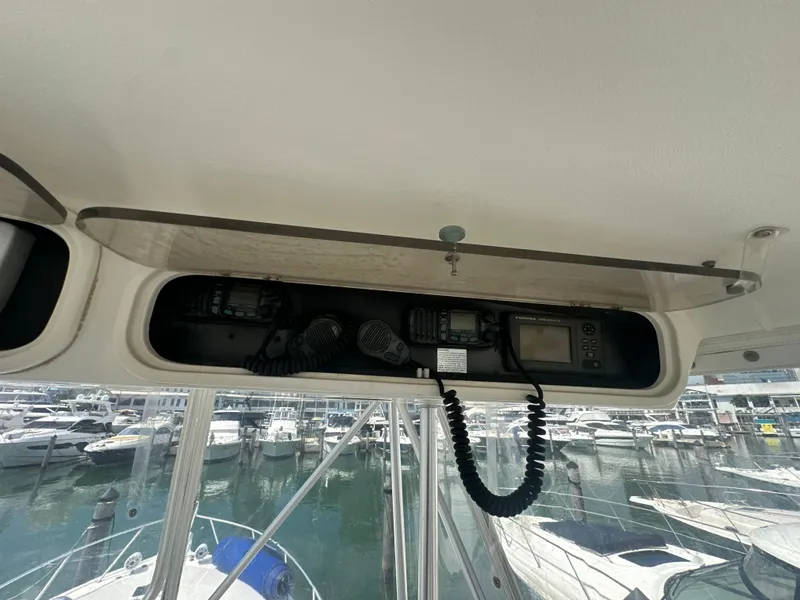 Slide: The Image of 1999 Ocean 45 Super Sport boat electronics panel at marina. - 10