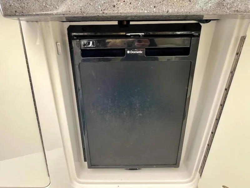 Slide: The Image of Dometic refrigerator in 2012 Sea Ray 330 Sundancer boat kitchen area. - 12