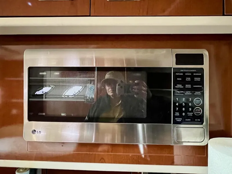 Slide: The Image of LG microwave in a 2012 Sea Ray 330 Sundancer yacht kitchen. - 29