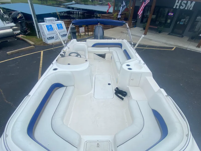 Slide: The Image of 2012 Hurricane SunDeck Sport 201 OB boat with spacious seating and modern design. - 13