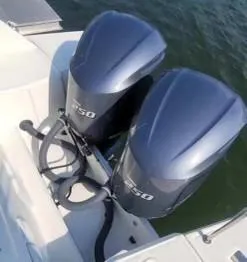 Slide: The Image of Twin outboard motors on a 2020 Jeanneau Leader 9.0 WA boat. - 4