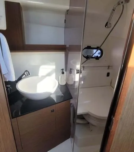 Slide: The Image of 2020 Jeanneau Leader 9.0 WA bathroom with modern fixtures and compact design. - 6